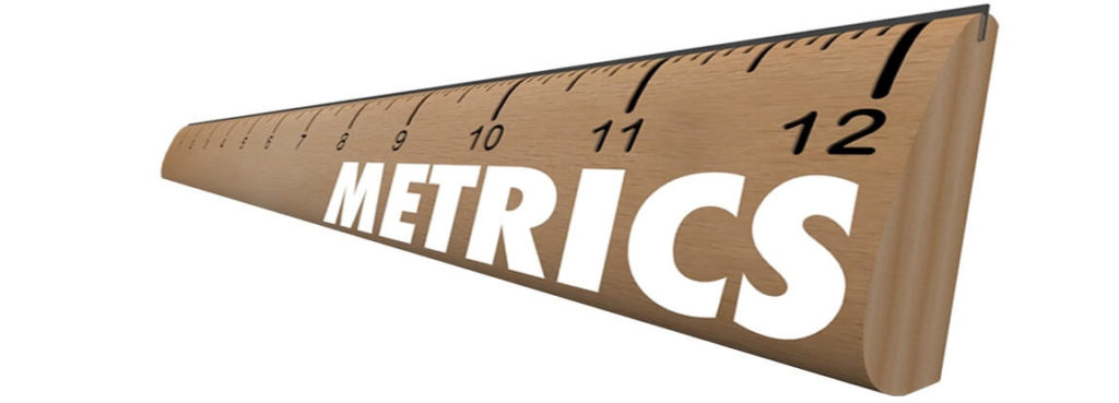 A ruler with the word metrics on it